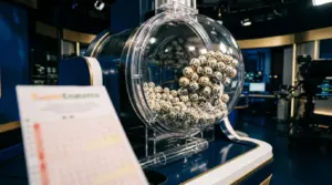 SuperEnalotto lottery balls and ticket suggesting a record-breaking Italian jackpot